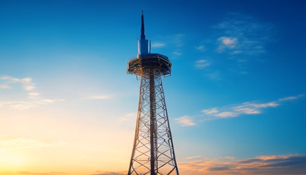 5G tower against blue sky in editorial style