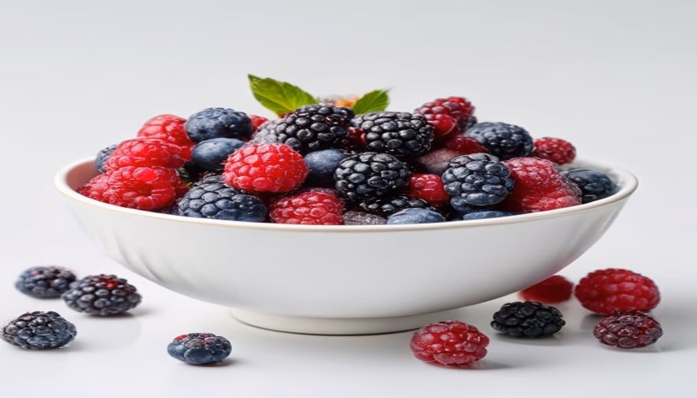 fresh berries in white bowl in editorial style