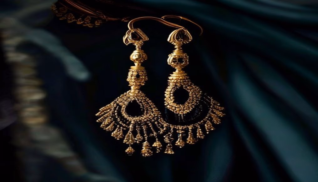 jhumka earrings indian gold in luxury editorial photography