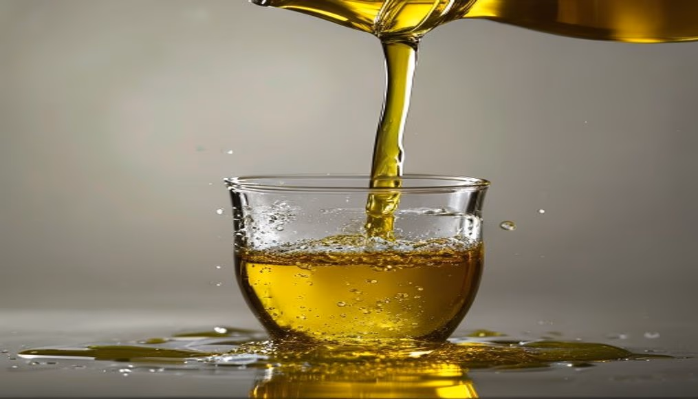 olive oil pouring closeup in editorial style