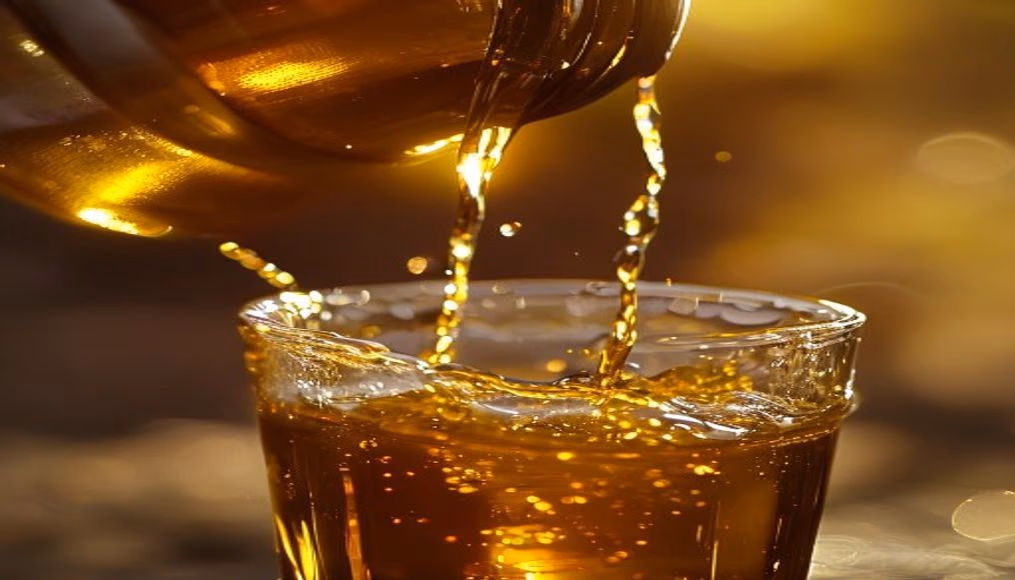 olive oil pouring closeup in editorial style