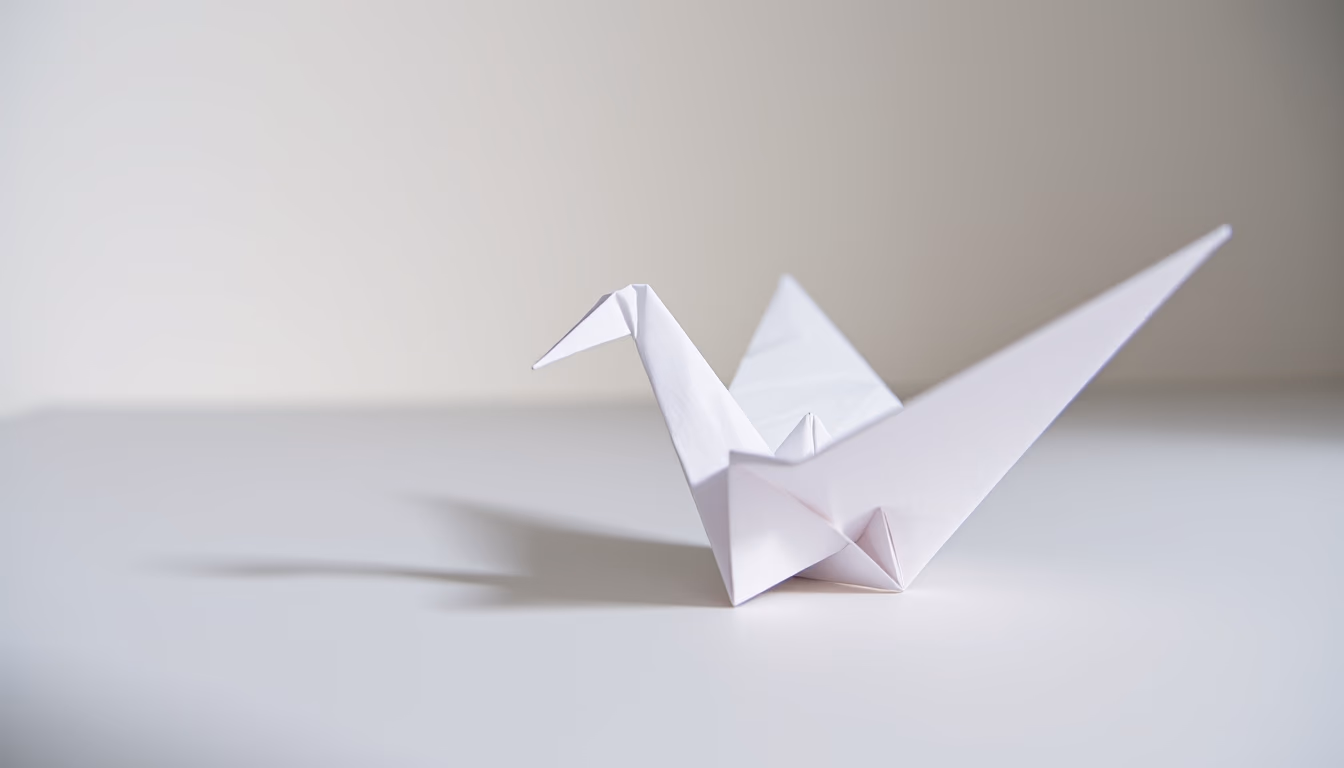 origami crane paper white in editorial style