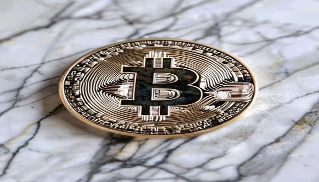 physical bitcoin coin on white marble in editorial style